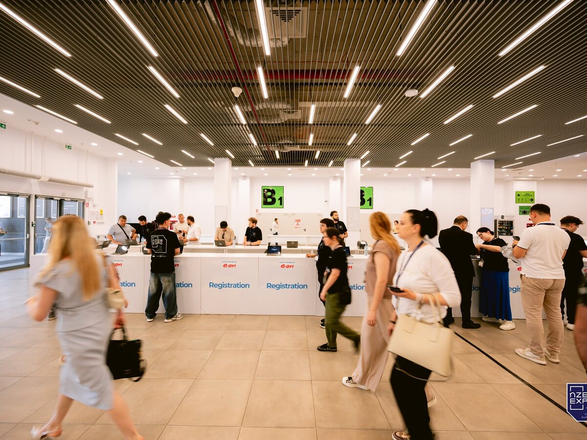 Attendees arriving at a MyConnector event registration area.